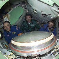 Expedition 11 in Soyuz TMA trainer simulator (ESA)