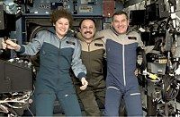Expedition 2 in Destiny lab, wearing warm coveralls