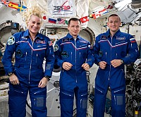 ISS-64 in jumpsuits
