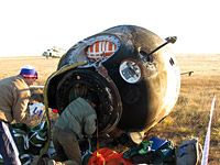 Expedition 11 are retrieved from the Soyuz capsule